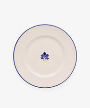 Beatrix Dinner Plate, Set of 4 features white ceramic with a thin blue rim and central blue floral design, shown on a plain white background.