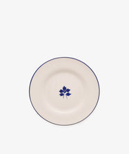 Beatrix Salad Plate, Set of 4—a white ceramic plate with a thin blue rim and botanical flower design, inspired by classic English blue-and-white china.