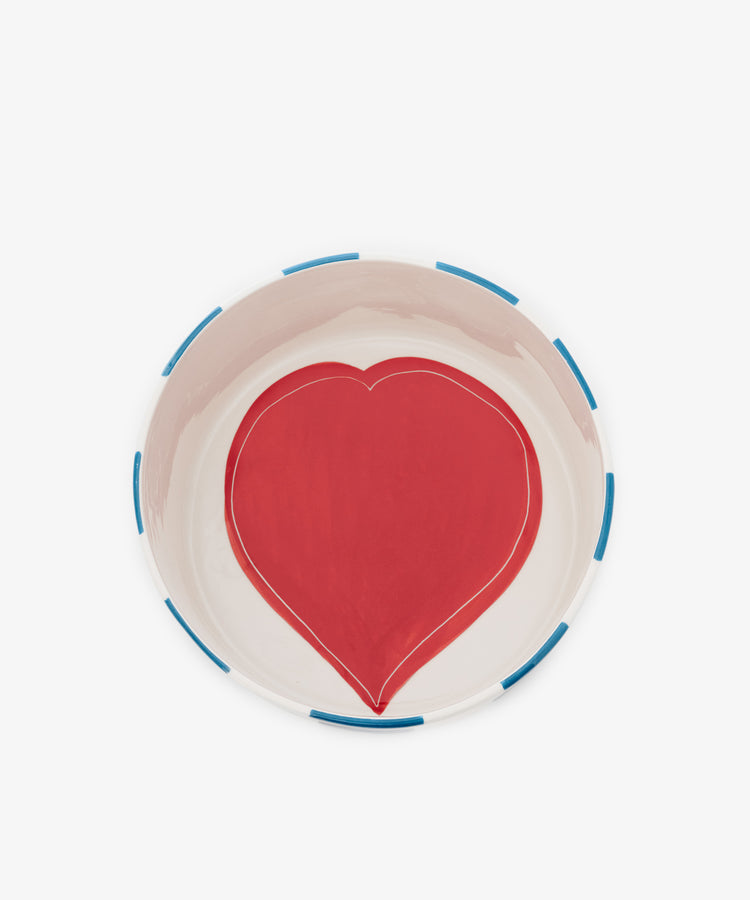 Round ceramic plate with a large red heart design in the center and a white background, featuring blue rectangular accents on the rim—perfect to pair with the Love Box for a charming and coordinated display.