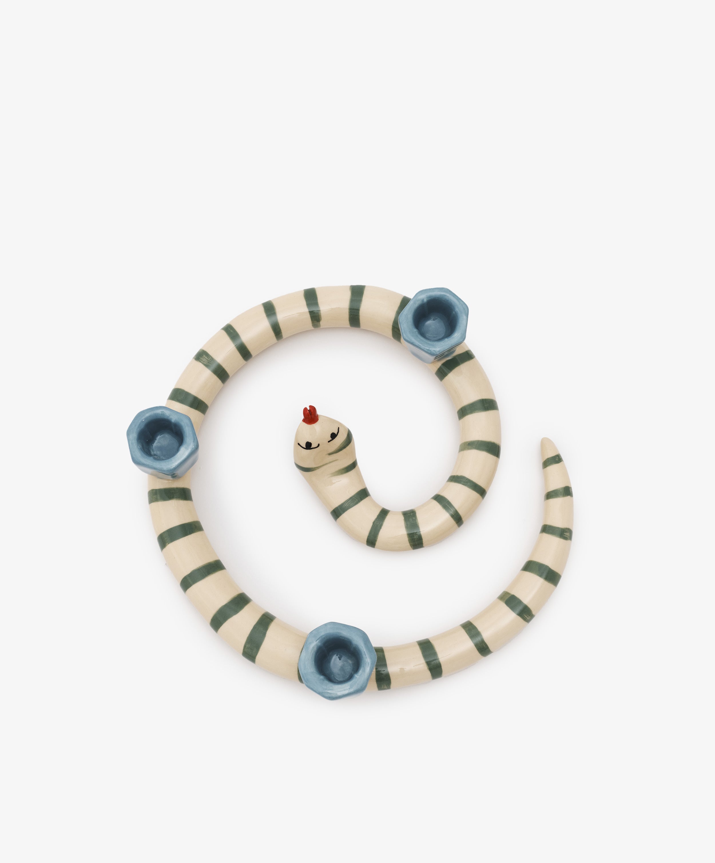 Sneaky Stripe Candle Holder by Laetitia Rouget. Glazed ceramic spiral striped snake with 3 candle slots, overhead view.