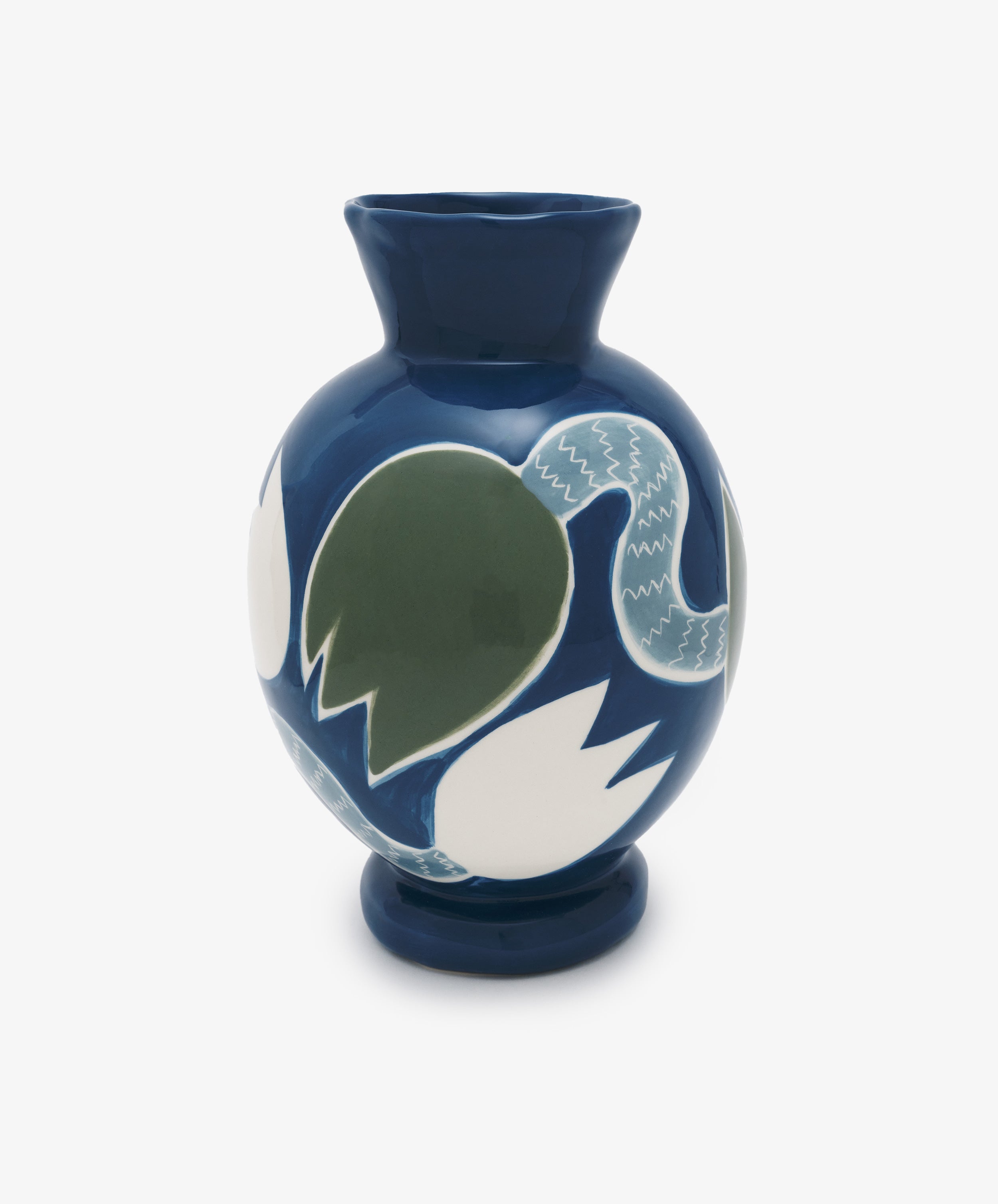 Tulip Flower Vase. Glazed ceramic vessel in indigo with white and green illustrated flowers, alt view.