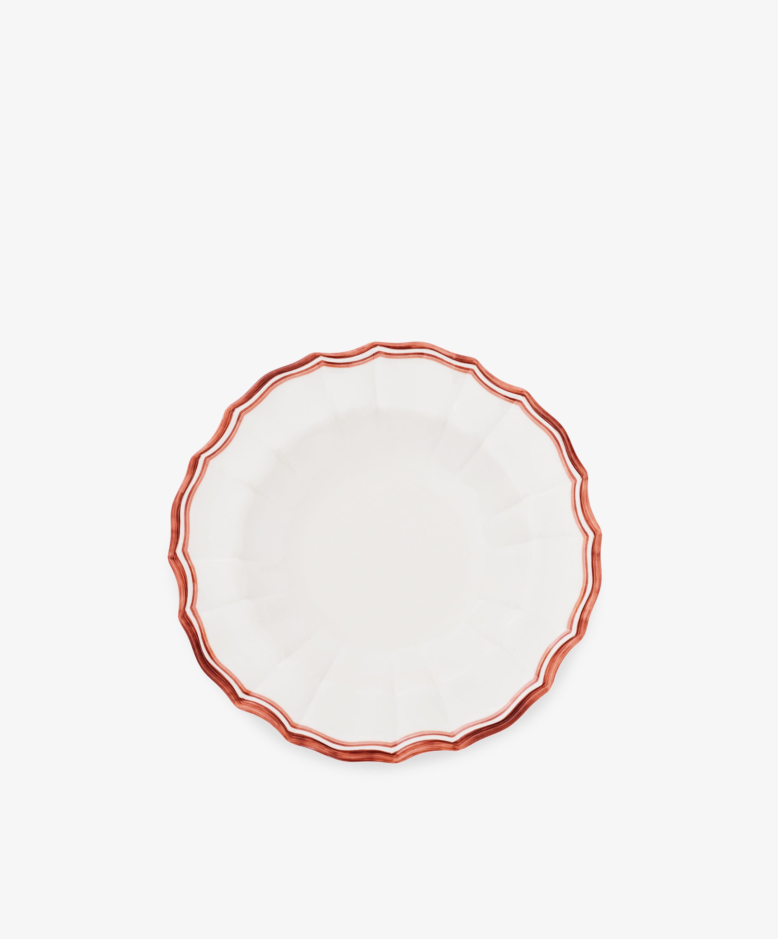 The Eva Melamine Bowl, Set of 4, features a white finish, scalloped edges, and a red-brown wavy border inspired by Italian practicality, photographed on a plain white background.
