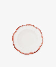 The Eva Melamine Bowl, Set of 4, features a white finish, scalloped edges, and a red-brown wavy border inspired by Italian practicality, photographed on a plain white background.
