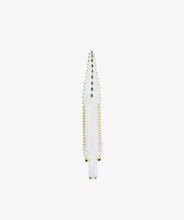 The Crokygris Centerpiece—a hand-blown borosilicate glass object shaped like a crocodile, adorned with green and yellow dotted accents—is showcased from above against a plain white background, exemplifying an exquisite glass crocodile centerpiece in the style of Massimo Lunardon.