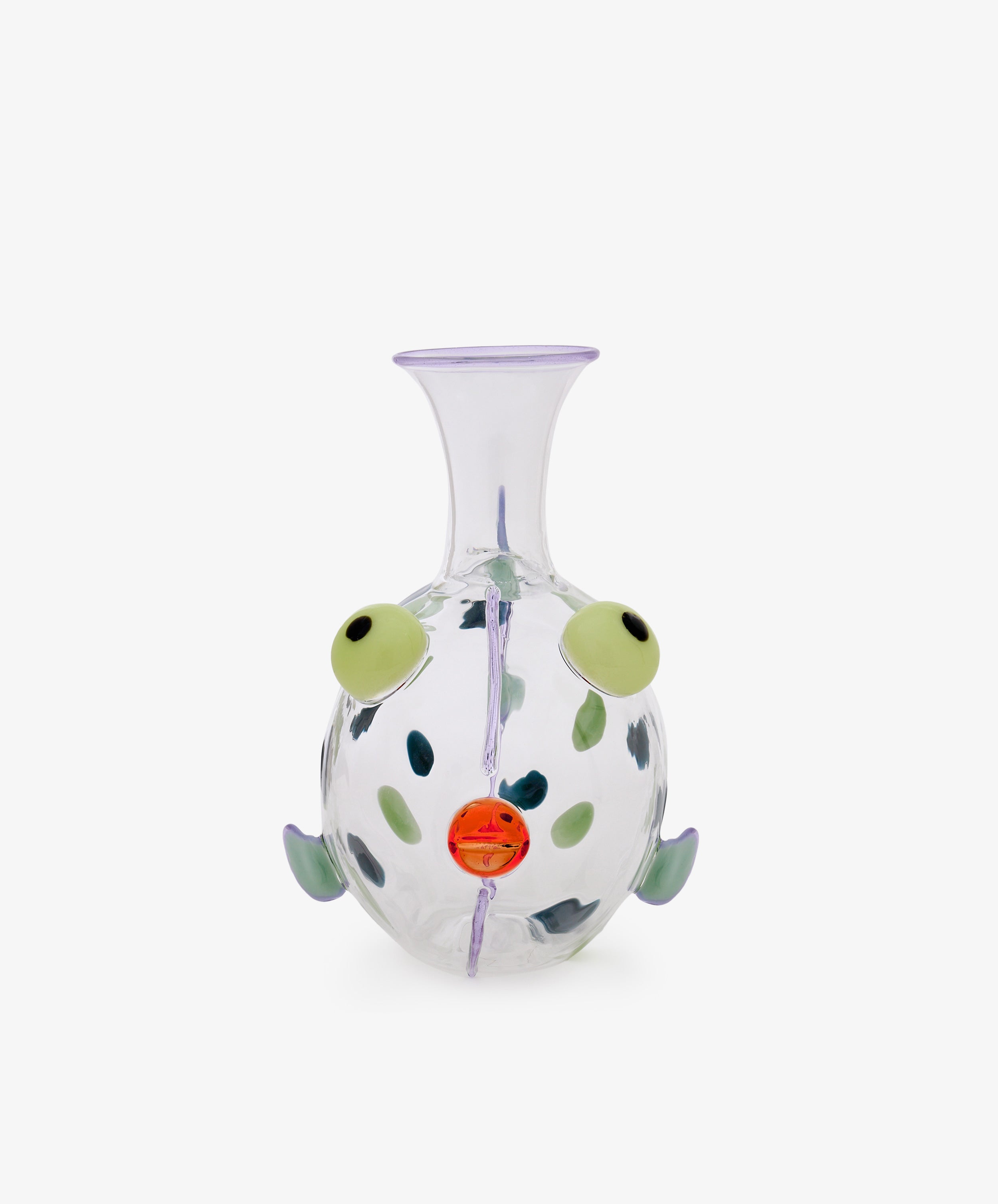 Dotfish Decanter—clear glass vase reminiscent of a round fish, featuring green eyes, an orange mouth, small fins, and whimsical purple accents in the style of Massimo Lunardon’s Murano glass creations, set against a plain white background.