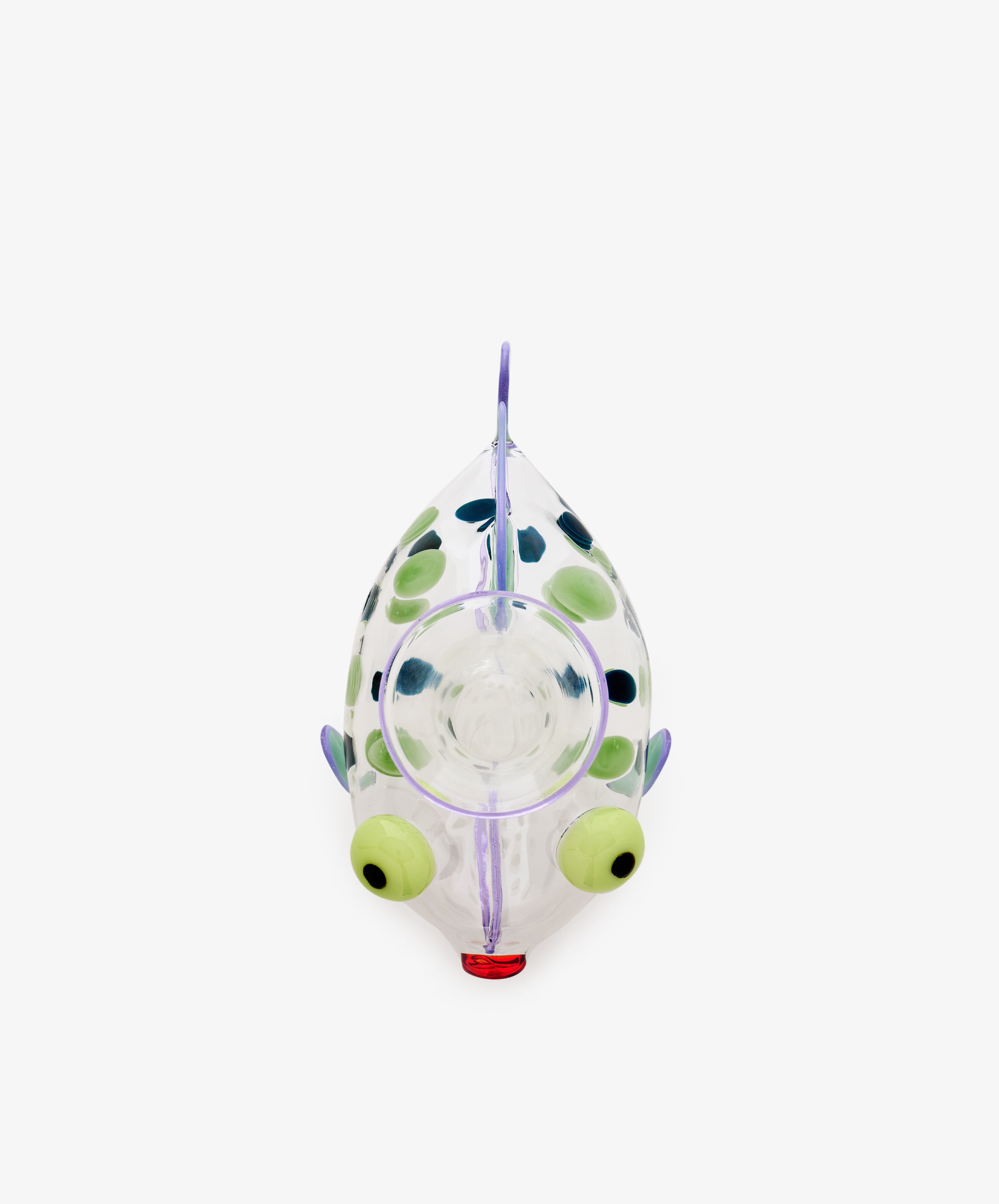 A Dotfish Decanter made from Murano glass, shaped like a fish and shown from above, features green eyes, blue spots, and a red mouth, displayed on a white background.