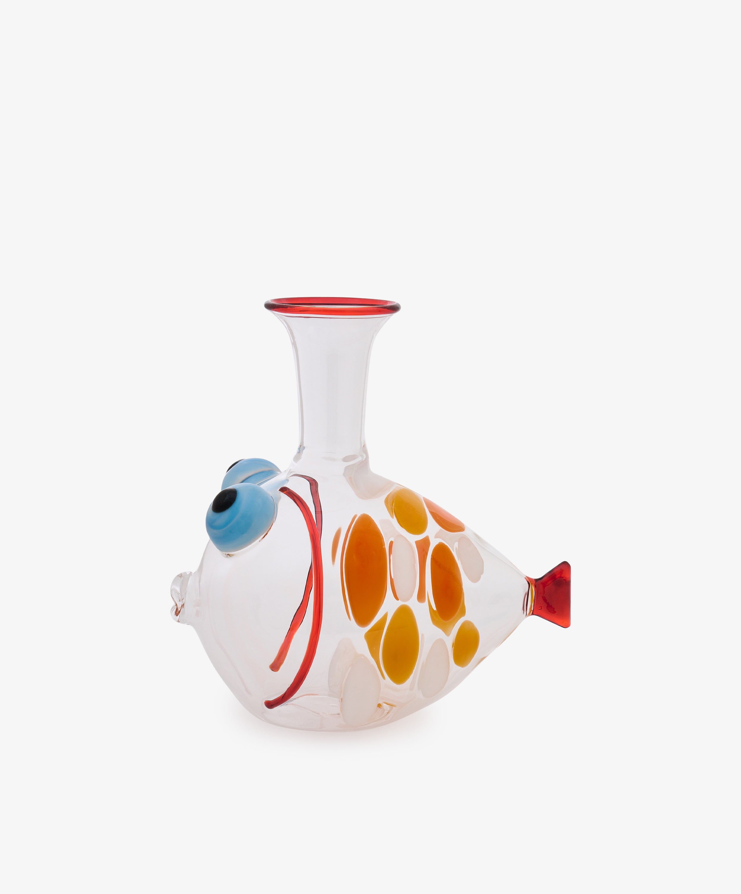 Clear Murano glass Fishpool Decanter shaped like a fish, featuring orange, yellow, and blue accents, a wide mouth at the top, and a red-tipped tail, displayed on a white background. This striking piece highlights the artistry of Massimo Lunardon’s Fishpool Decanter collection.