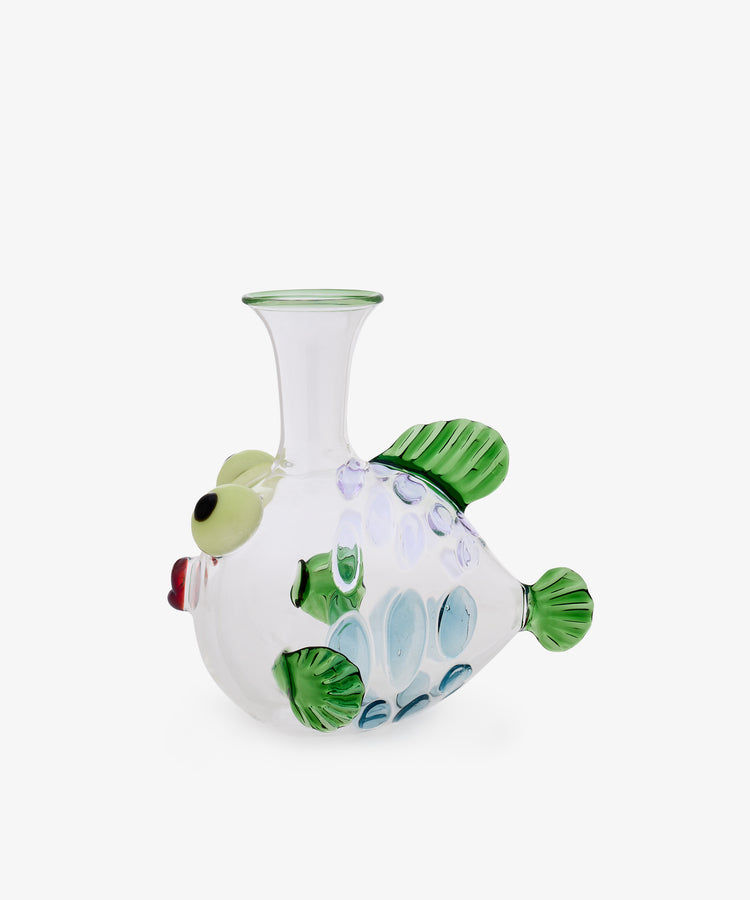 Molly Decanter: A clear Murano glass vase shaped like a fish in the style of Massimo Lunardon, featuring green fins, blue and purple spots, a red mouth, and a wide neck opening. Set against a white background.