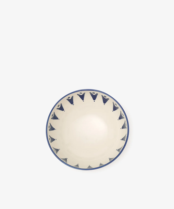 The Vito Cereal Bowl, Set of 4, features handmade ceramic bowls with cream interiors and blue geometric patterns around the rims, shown from above on a white background—ideal for everyday use.