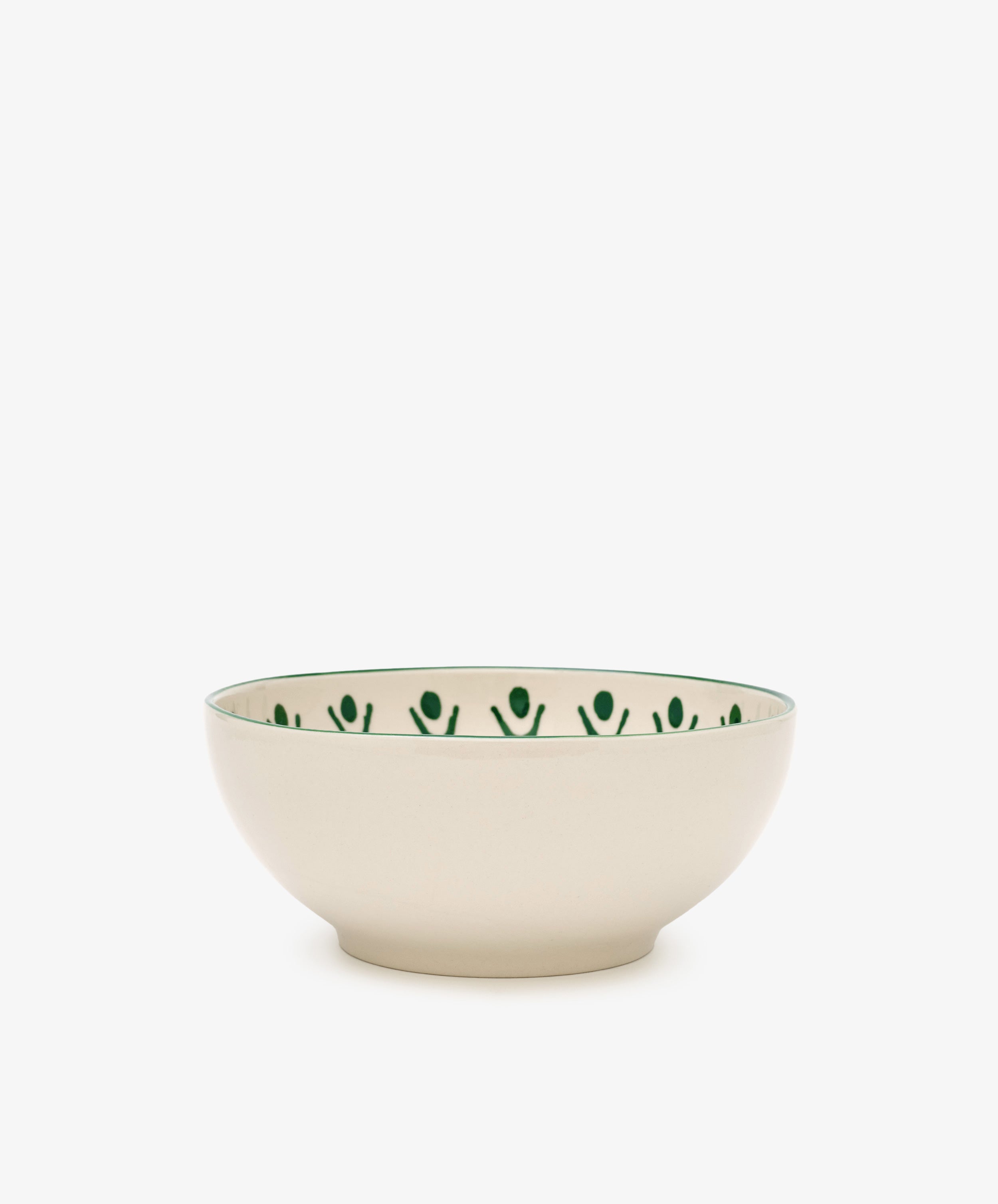 The Vito Cereal Bowl, Set of 4, features handmade cream-colored ceramic bowls with a green stylized human pattern along the inner rim—designed for everyday use.