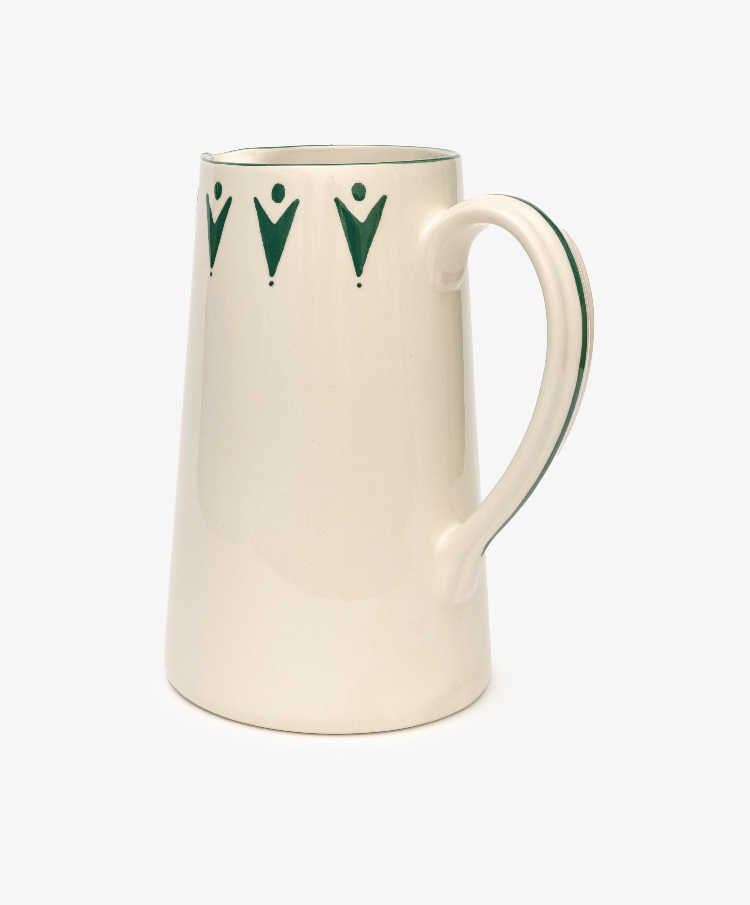 The Vito Jug is a cream ceramic piece with a curved handle and green geometric accents by the rim—handmade to add charm to any unique glassware collection.