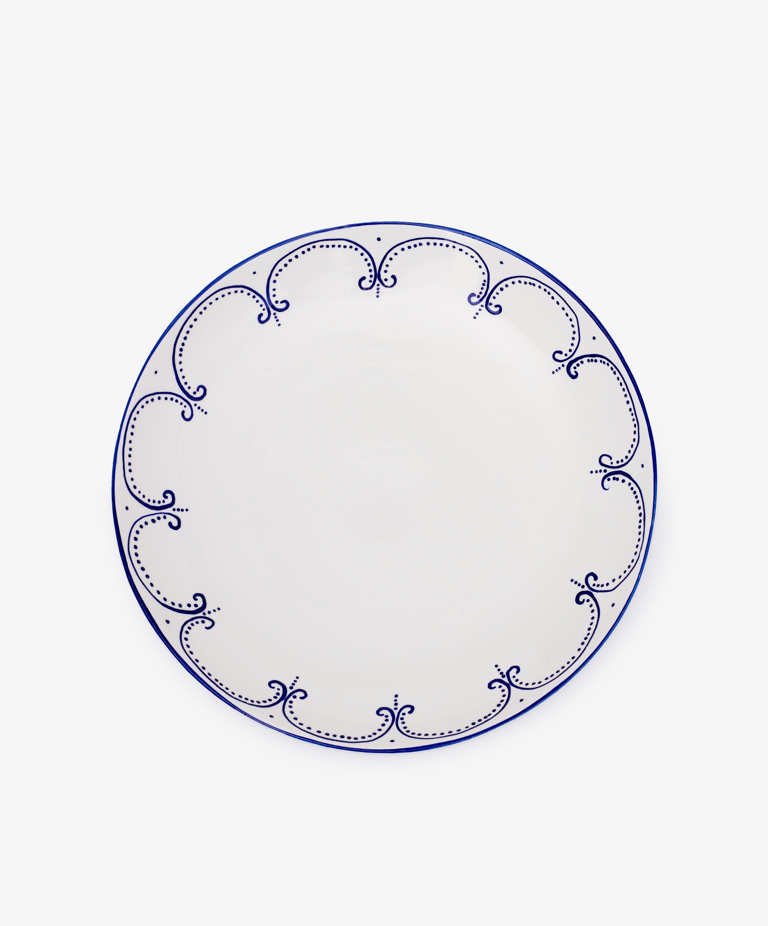 The Arco Serving Platter is a white ceramic Portuguese piece featuring a blue decorative rim, displayed on a plain white background.