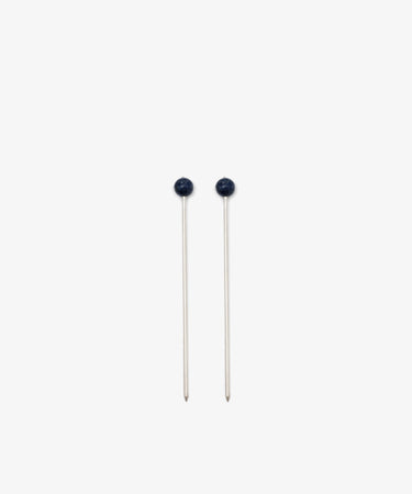 The Ella Cocktail Sticks, Set of 2, are displayed parallel to each other on a plain white background, their dark round heads evoking the look of elegant sewing pins.