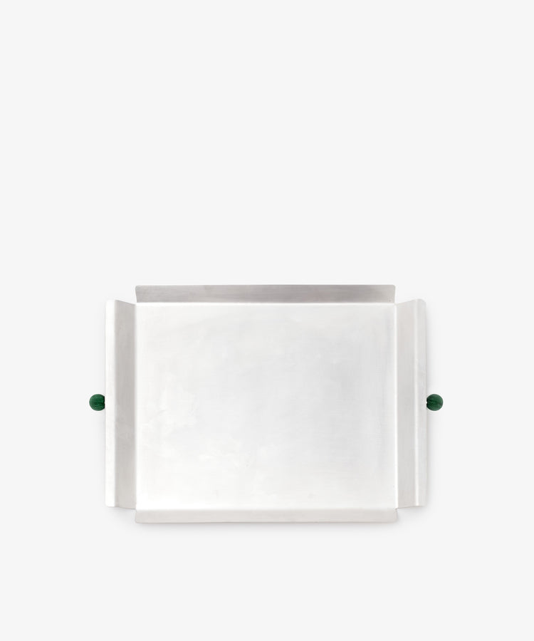 The Freya Serving Tray features a rectangular silver design, raised sides, and two green stone handles—a unique home decor piece shown on a plain white background.