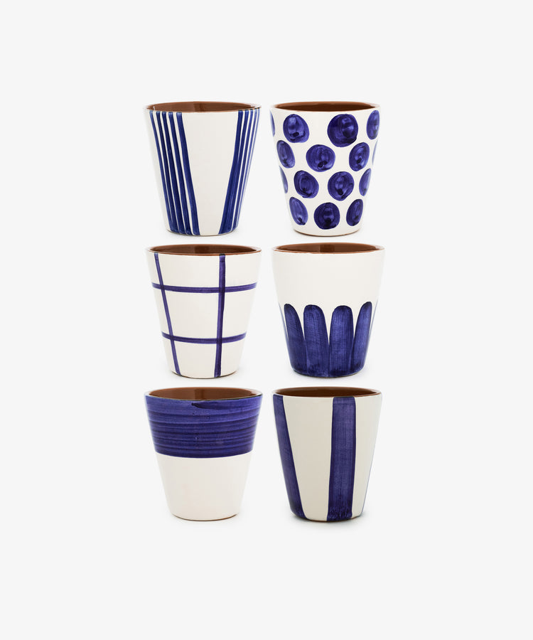 Six Lula Cups, each featuring unique blue and white geometric patterns, are arranged in two vertical columns against a white background.