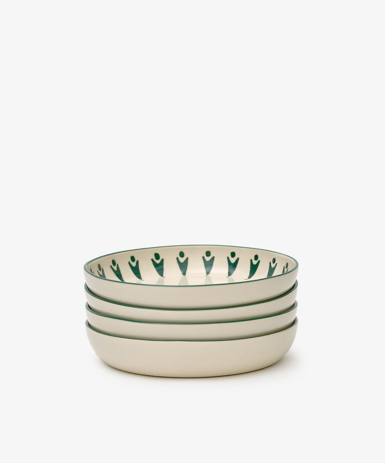 The Vito Pasta Bowl Set includes four beige ceramic bowls with a green inner rim pattern, ideal for everyday use. Displayed on a plain white background.