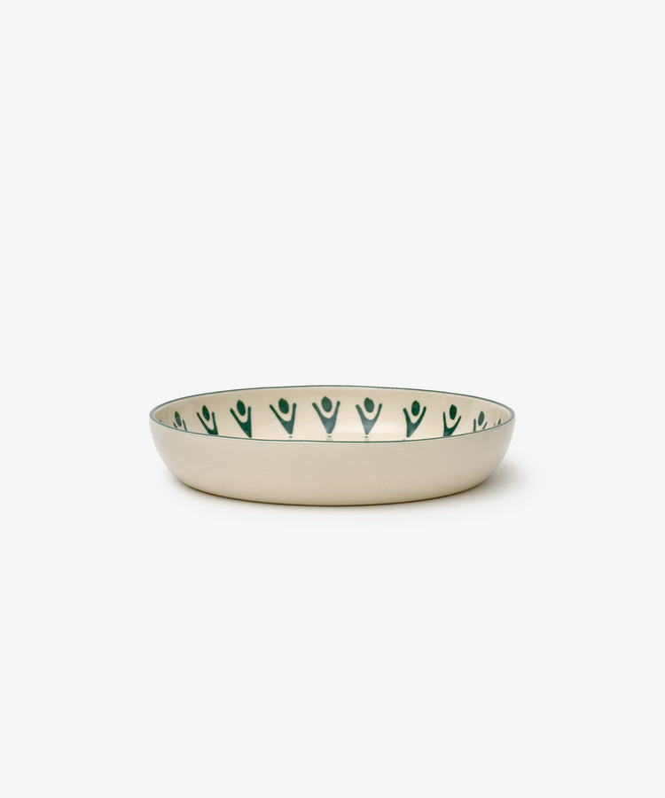 The Vito Pasta Bowl, Set of 4, features shallow round ceramic bowls with a cream exterior and a white interior rimmed with green abstract figures—ideal for everyday use.
