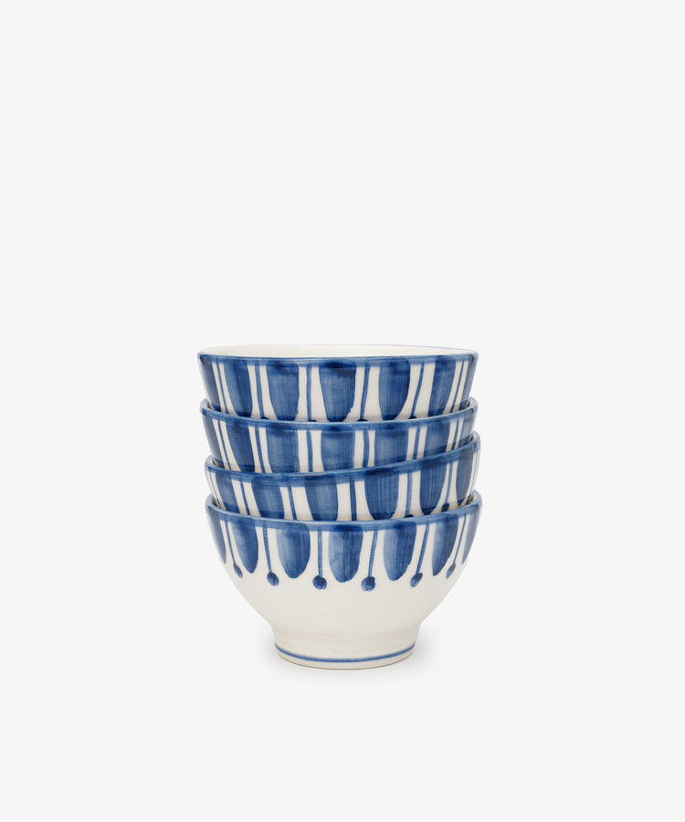 Set of 4 Jorge Cereal Bowls, featuring a blue and white geometric pattern, stacked together and displayed against a plain white background.