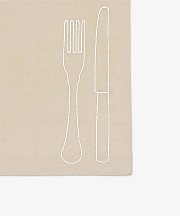 The Fourchette & Couteau Napkins, Set of 6, are beige cloth napkins featuring a simple white outline of a fork and knife—perfect for adding whimsical table decor to any setting.