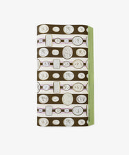 A folded rectangular Intaglio Stripe Gift Wrap featuring classical coin and cameo designs on a brown background with a green edge—perfect for neoclassical gifts from Parvum Opus.