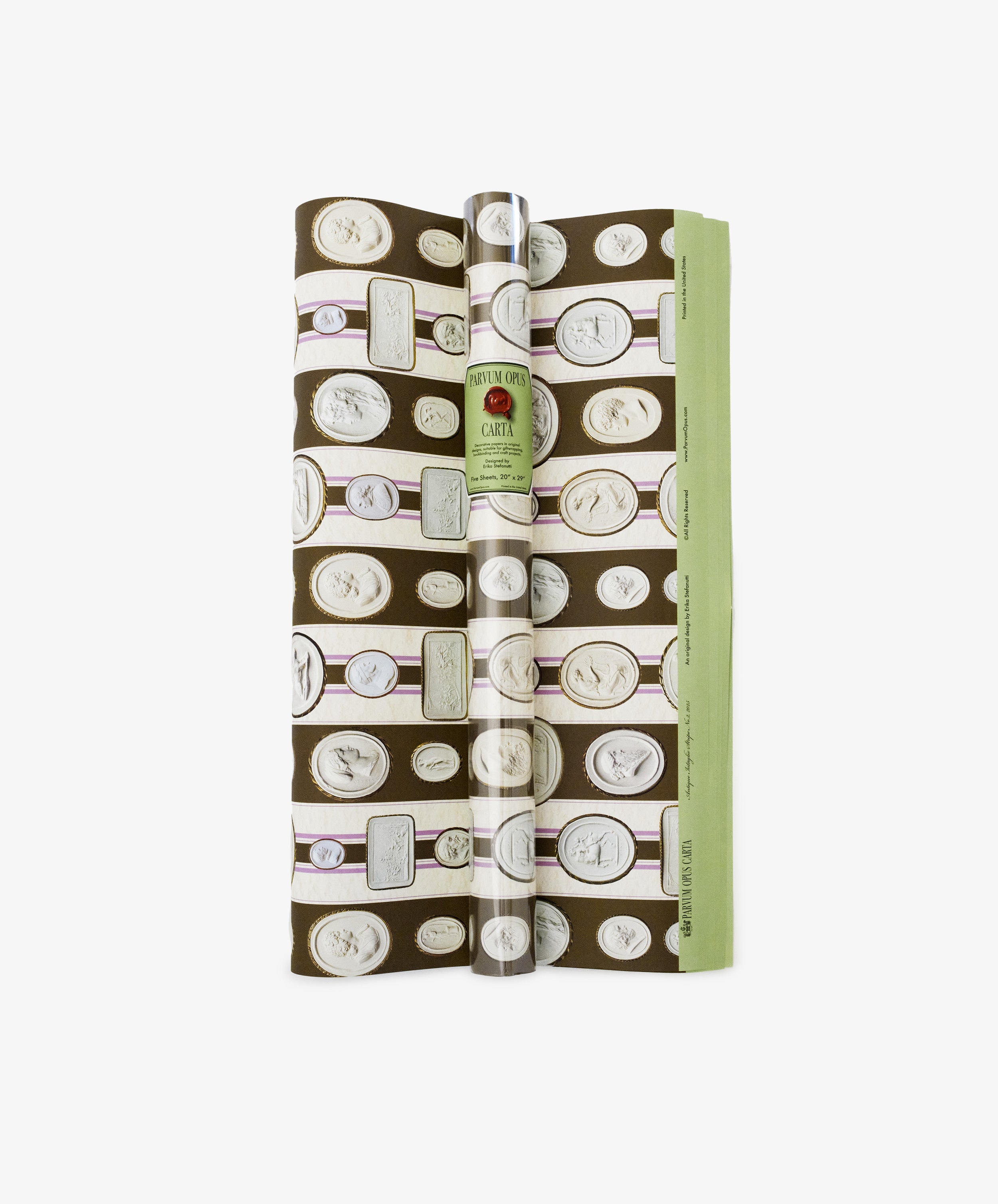 Intaglio Stripe Gift Wrap features a brown background with repeating white cameo medallion patterns, inspired by Parvum Opus—an elegant, neoclassical choice for stylish gift wrapping.