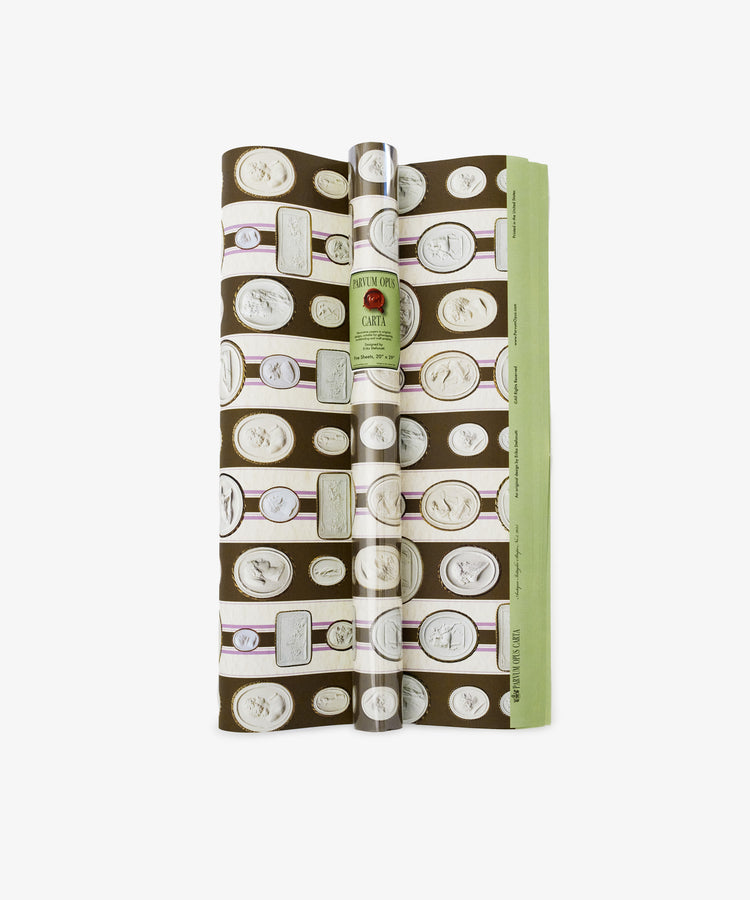 Intaglio Stripe Gift Wrap features a brown background with repeating white cameo medallion patterns, inspired by Parvum Opus—an elegant, neoclassical choice for stylish gift wrapping.