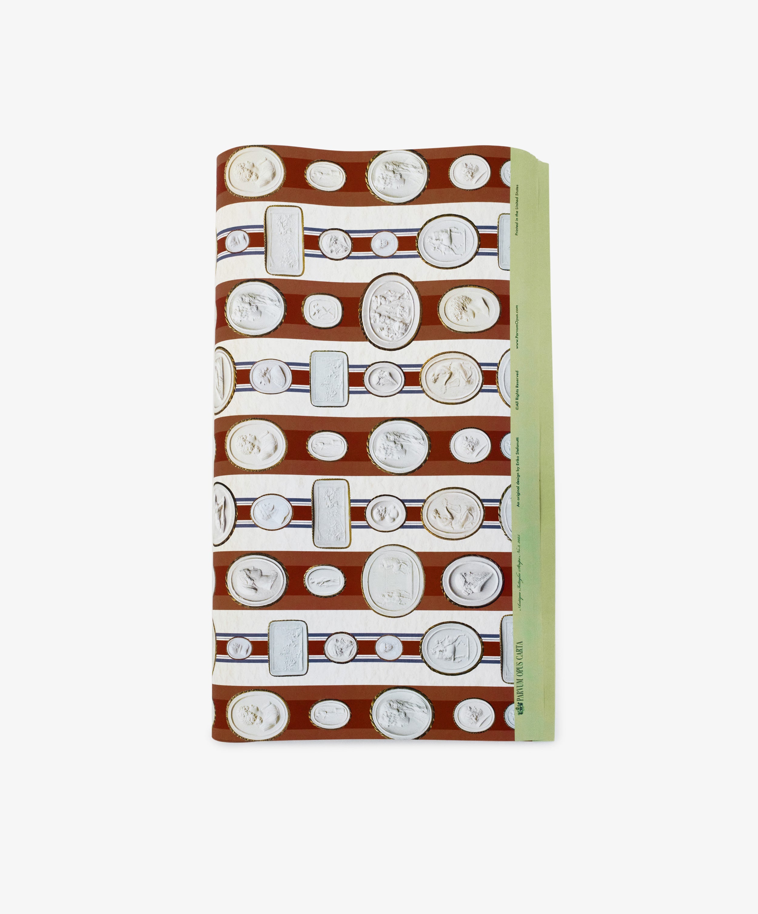 The Intaglio Stripe Gift Wrap features a brown and white pattern of classical cameo portraits in rows, accented by a light green edge for an elegant neoclassical look.