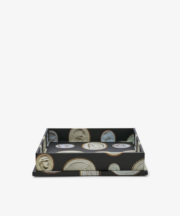 Intaglio Nesting Tray—a rectangular black archival book board tray with raised sides, featuring large ancient coin illustrations on both the inner and outer surfaces.