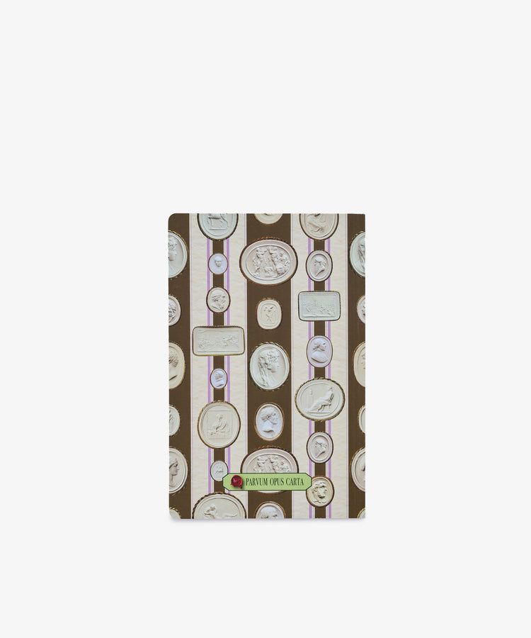 Introducing the Intaglio Notebook—a pocket-sized notebook featuring a cover adorned with vertical stripes and an array of classical cameo portraits in oval frames set against a brown background, crafted with acid-free writing paper for lasting quality.