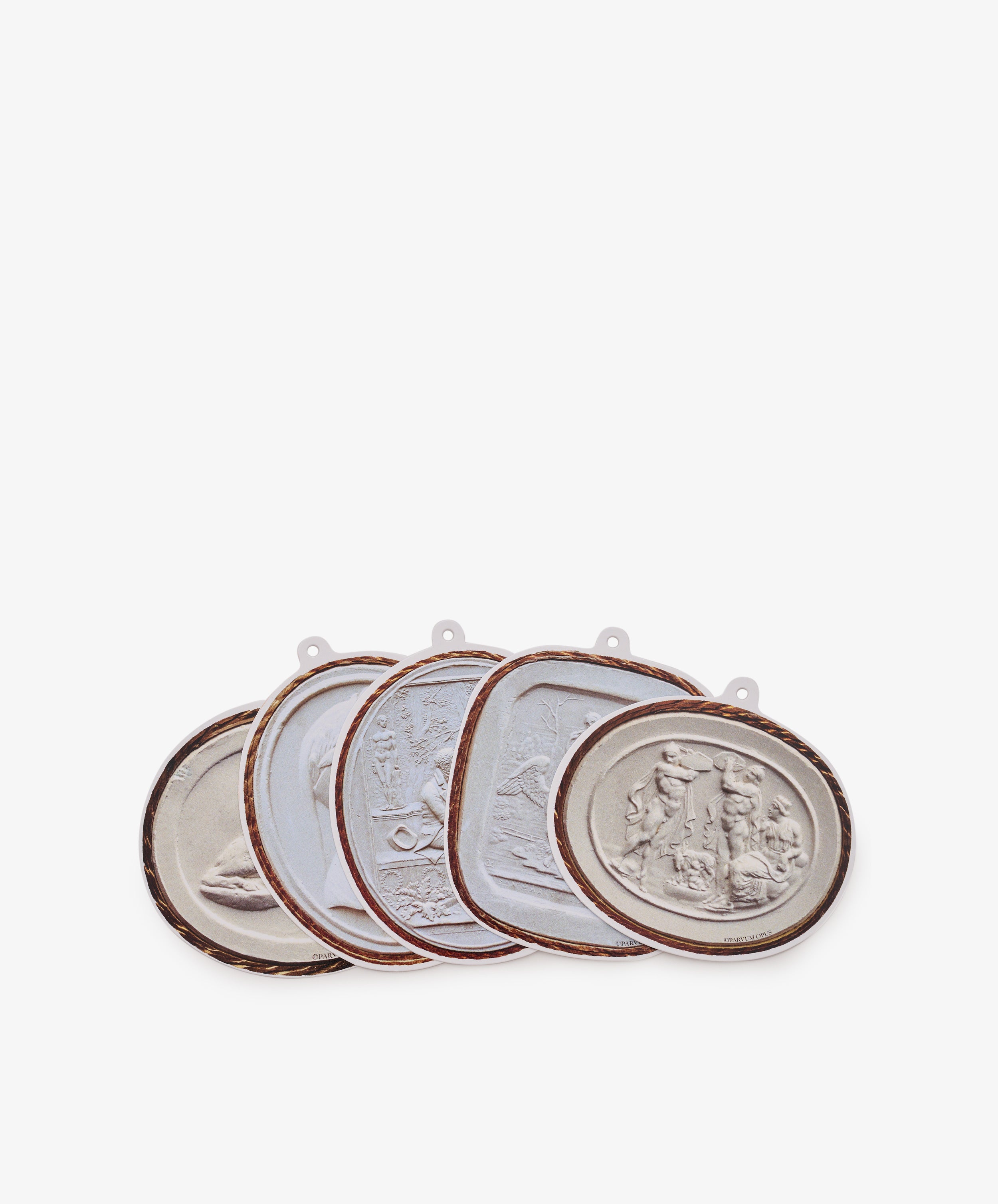 Intaglio Tages, Set of 5: This collection features five decorative oval medallions, each crafted from heavy cardstock and adorned with raised classical figures, framed by elegant copper-colored edges. Displayed overlapping in a row, they make the perfect elegant gift tags.