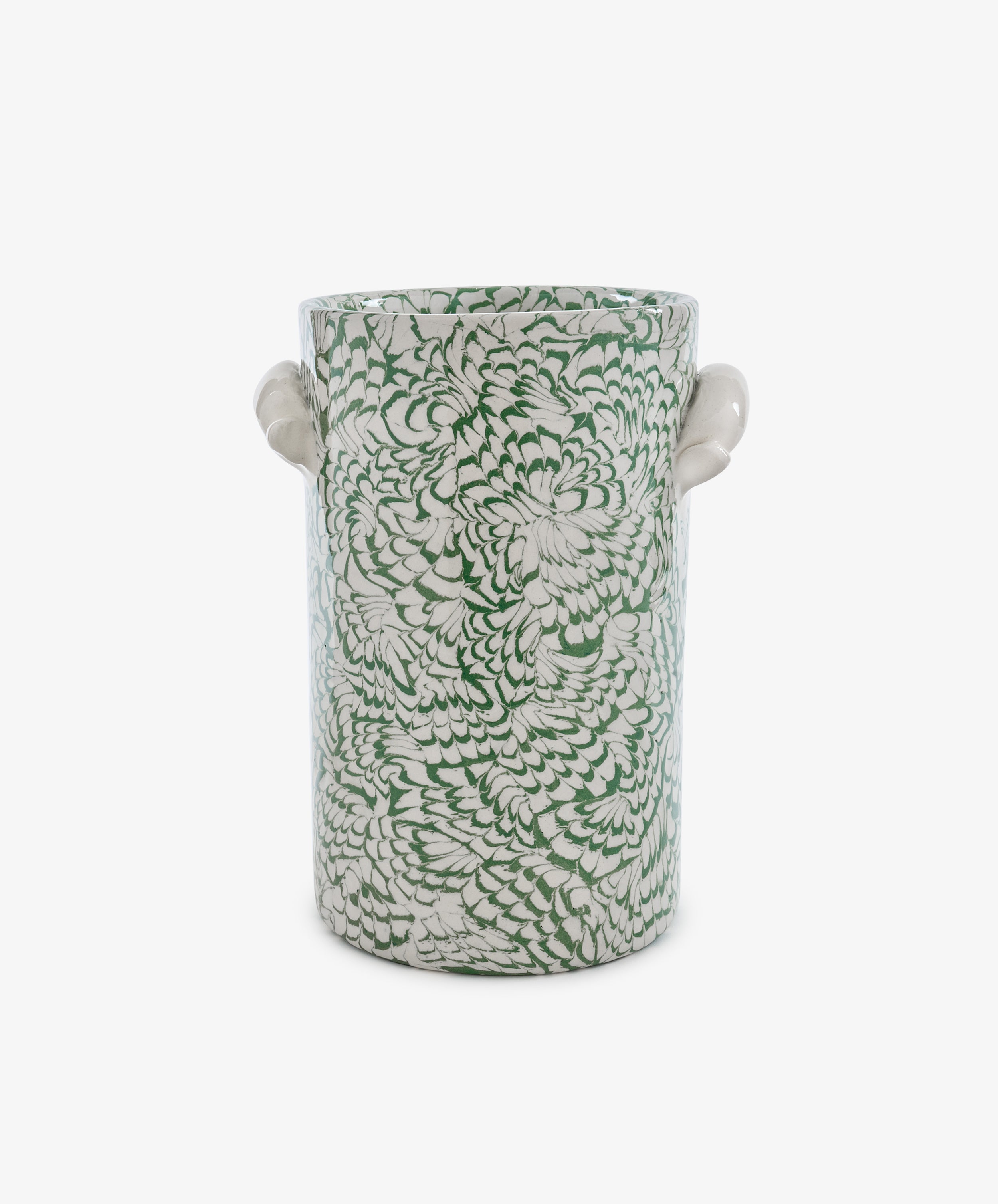 The Celine Wine Cooler is a cylindrical ceramic vessel with two small side handles, adorned with a dense green and white floral pattern on a white background that evokes the look of marbled ceramic artistry.