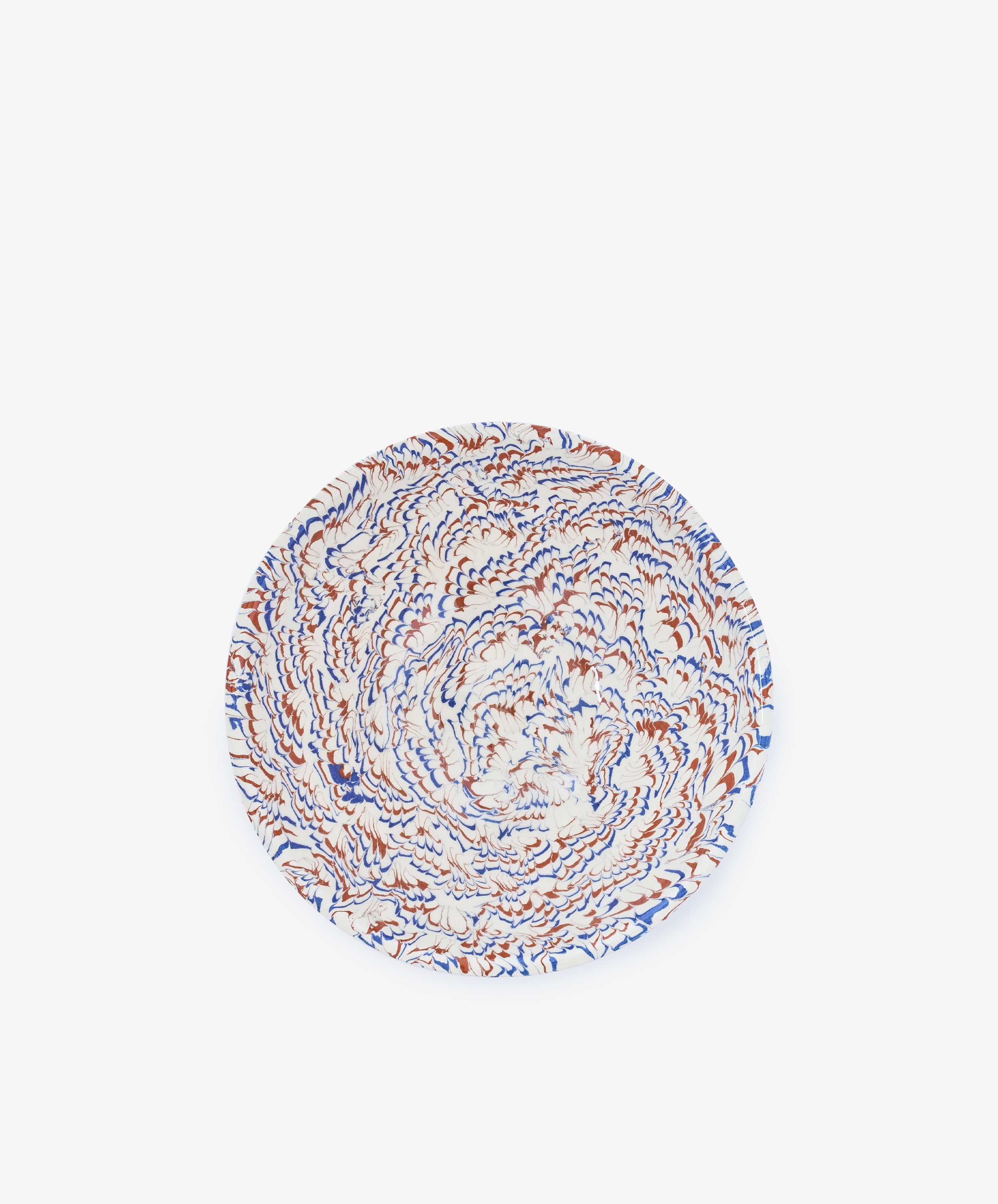 A round marbled ceramic Celine Salad Bowl featuring a swirling abstract pattern in blue, orange, and white on a plain white background.