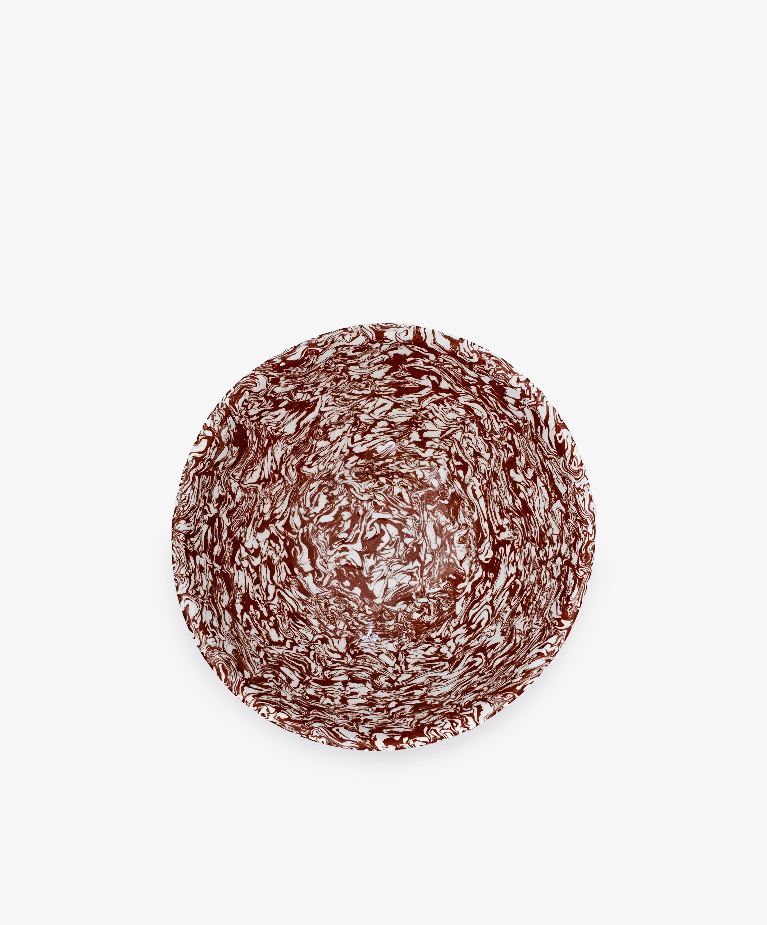 The Celine Salad Bowl is a handmade tableware piece featuring striking brown and white marbled patterns, beautifully displayed from above against a plain white background.