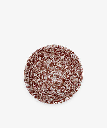 The Celine Salad Bowl is a handmade tableware piece featuring striking brown and white marbled patterns, beautifully displayed from above against a plain white background.