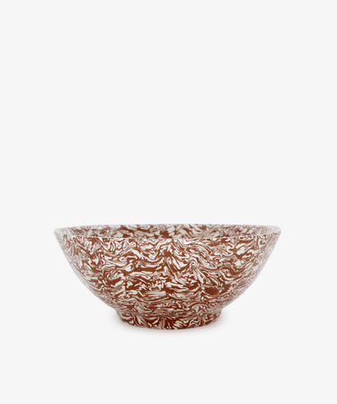 The Celine Salad Bowl is a handmade piece featuring brown and white marbled patterns, beautifully displayed against a plain white background.