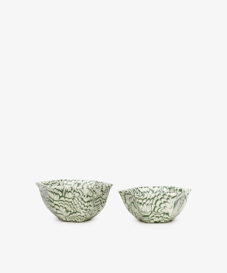 Two Celine Snack Bowls in green and white ceramic, featuring floral patterns, are displayed side by side on a white background—making elegant additions to any French serveware collection.