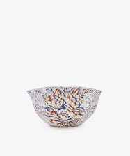 The Celine Snack Bowl showcases an intricate marbled wave pattern in blue, red, and brown on a white background, presented against a plain white surface.