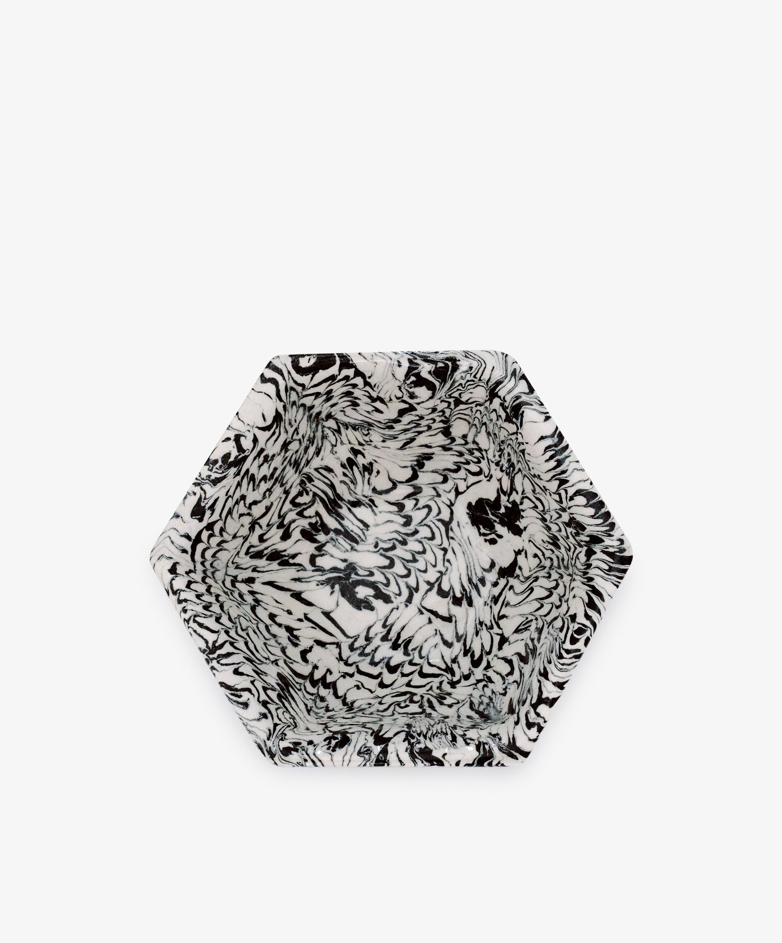 The Celine Snack Bowl features a hexagonal shape with a striking black and white marbled pattern on both the interior and exterior, reminiscent of handcrafted Aptware, shown from above against a plain white background.