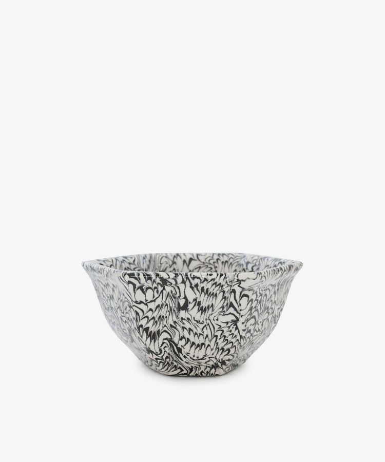 The Celine Snack Bowl is a handcrafted Aptware ceramic piece featuring a unique marbled effect with intricate black and white floral or leaf patterns, displayed against a plain white background.