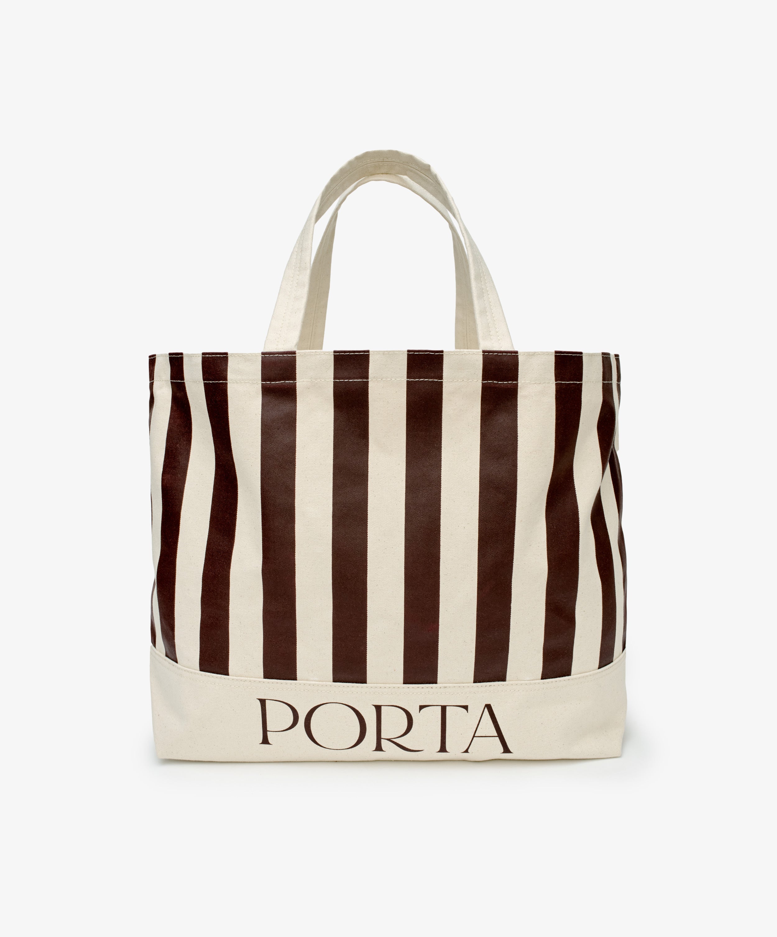 The PORTA Canvas Tote Bag is an oversized canvas tote with vertical brown and white stripes and PORTA printed in brown at the bottom.