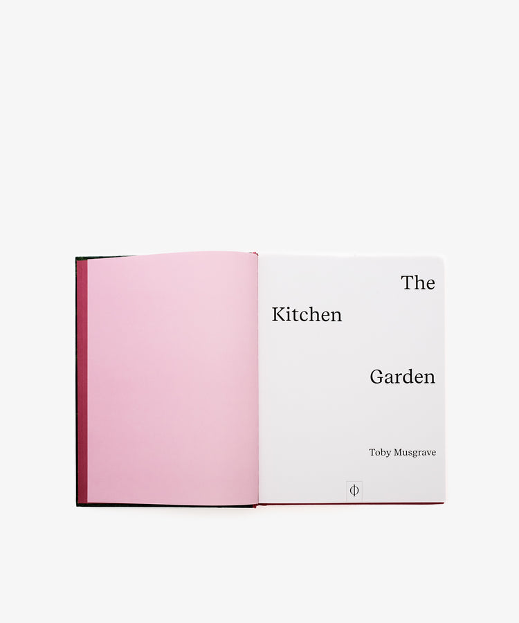 An open book titled The Kitchen Garden, featuring a pink left page and a title page on the right, provides insights into garden history and techniques for growing gardens.
