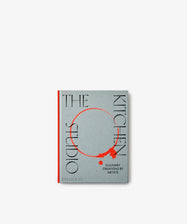 The Kitchen Studio: Culinary Creations by Artists is a gray art cookbook featuring black and red text with a red circular design on the cover, offering unique recipes crafted by contemporary artists.
