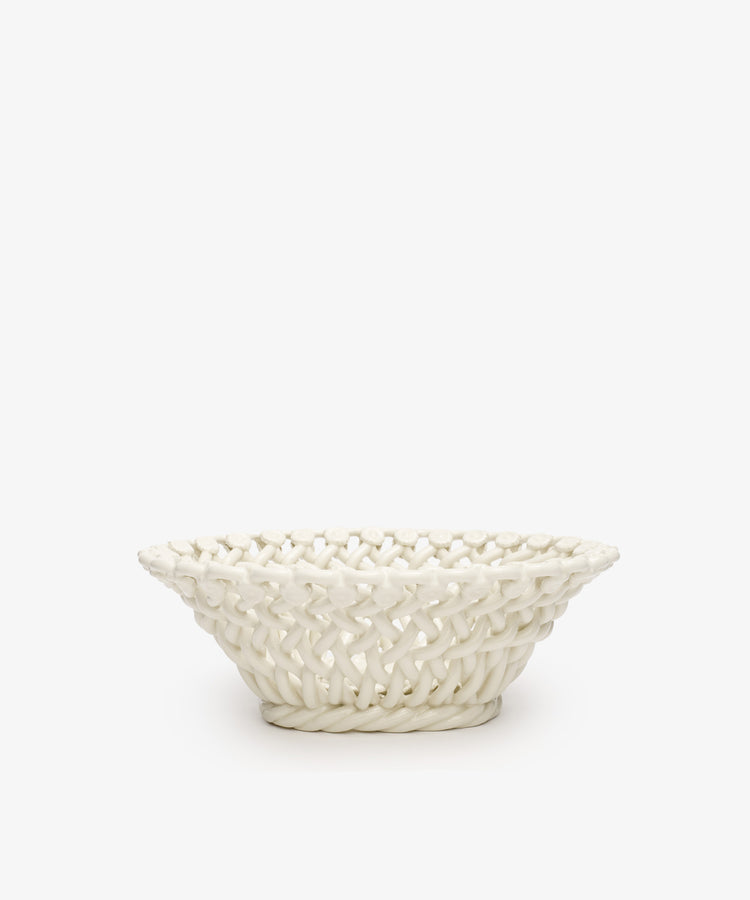 The Remi Decorative Flower Fruit Bowl features a woven lattice design crafted from hand-braided white ceramic, displayed against a plain white background for a sculptural statement.