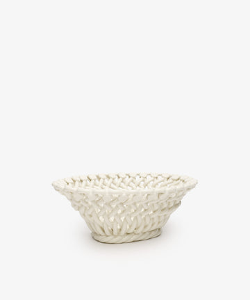 The Remi Decorative Flower Fruit Bowl is a white ceramic statement piece with an open lattice, woven design, shown against a plain white background.