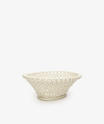 The Remi Decorative Fruit Bowl is a cream-colored woven ceramic piece featuring an open lattice design, beautifully crafted in the South of France and photographed on a plain white background.