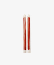 The Beckford Candle features two white taper candles with vertical red stripes, perfect for adding a touch of elegance to any setting.