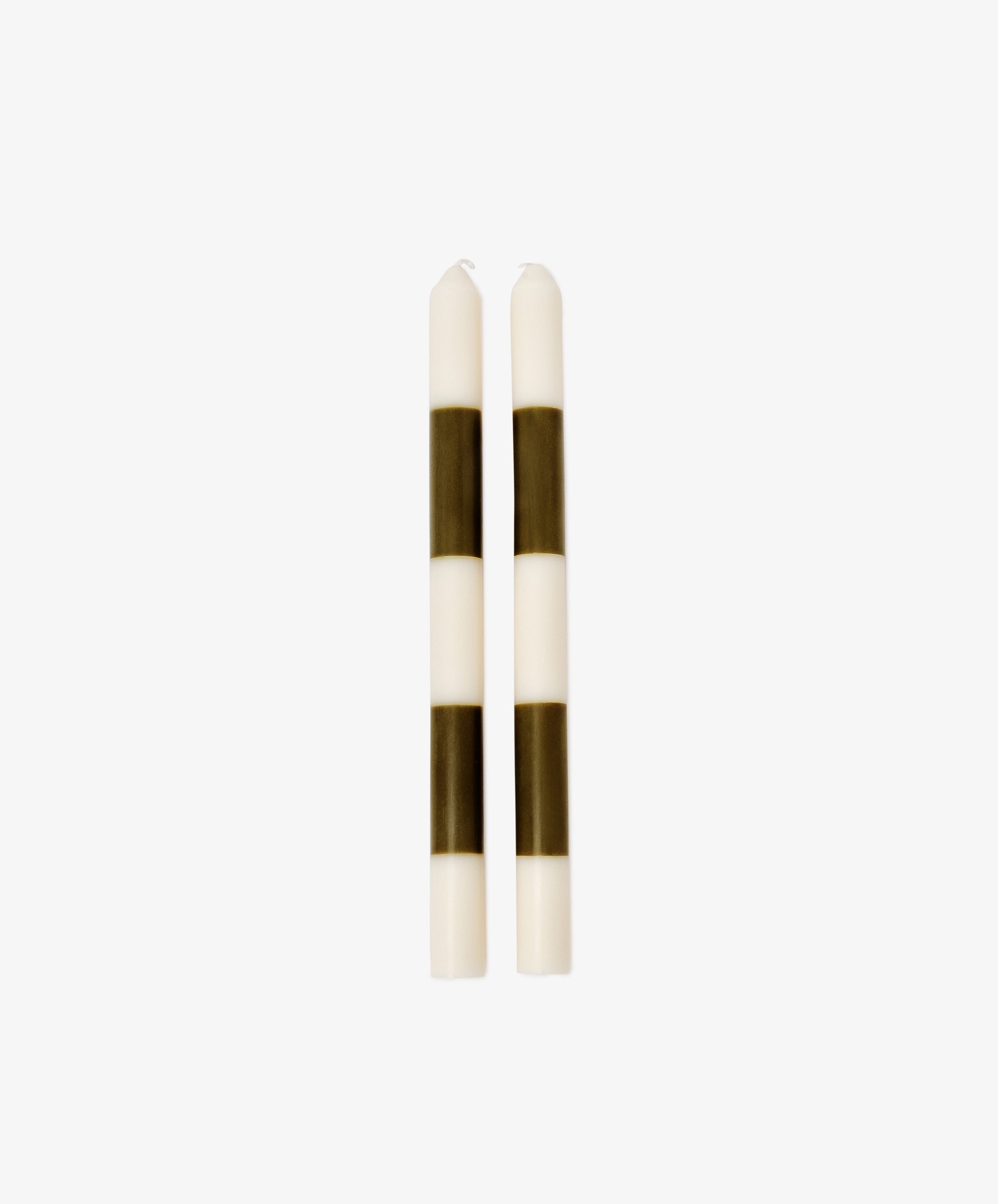 Two Hampstead Candles, white with three evenly spaced black horizontal stripes each, stand upright side by side on a plain white background.