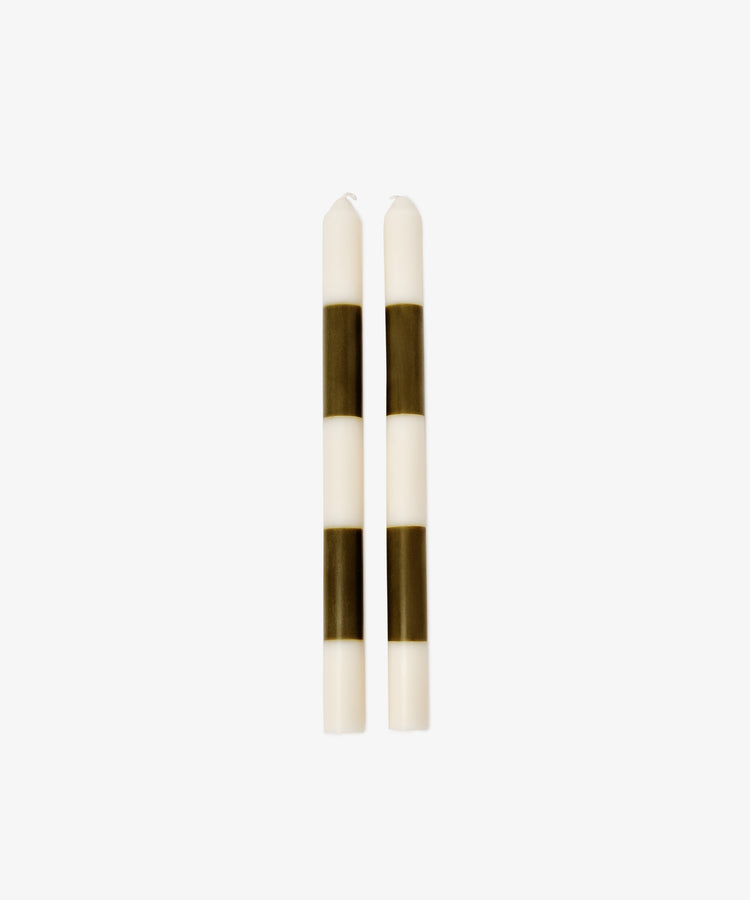 Two Hampstead Candles, white with three evenly spaced black horizontal stripes each, stand upright side by side on a plain white background.