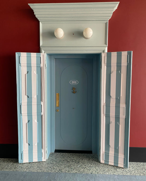 blue and white striped door