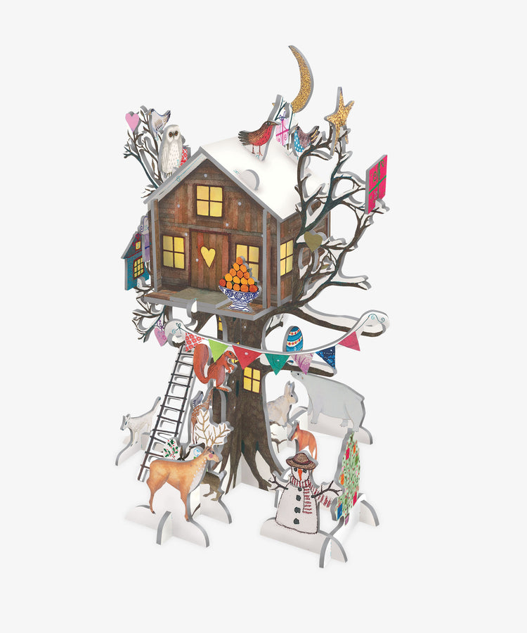 The Christmas Treehouse Advent Calendar features a festive treehouse with animals, a ladder, snowman, stars, banners, and snowy branches—perfect for a whimsical countdown to the season and bringing holiday tradition to life.